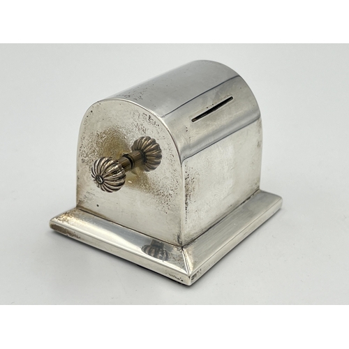 2299 - An Edwardian Charles & George Asprey hallmarked London silver stamp roll dispenser, dated 1903