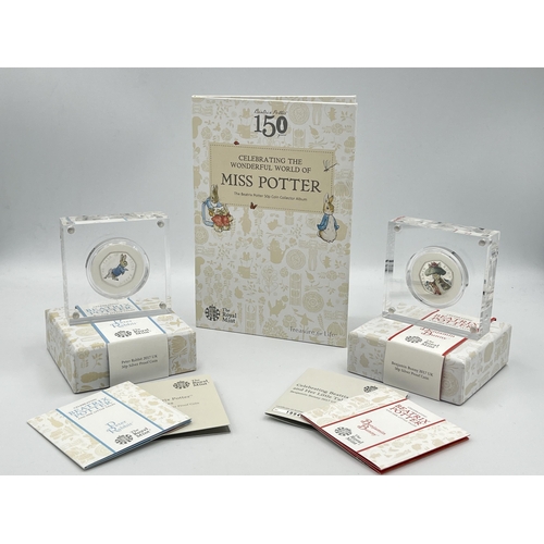 2303 - Three The Royal Mint Beatrix Potter 50p coin items, one Celebrating The Wonder World of Miss Potter ... 