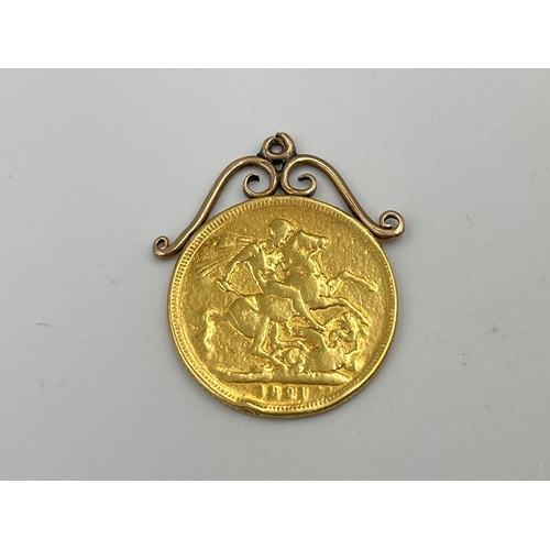 2310 - An 1821 George IV 22ct gold full sovereign with yellow metal mount - approx. gross weight 8.36g