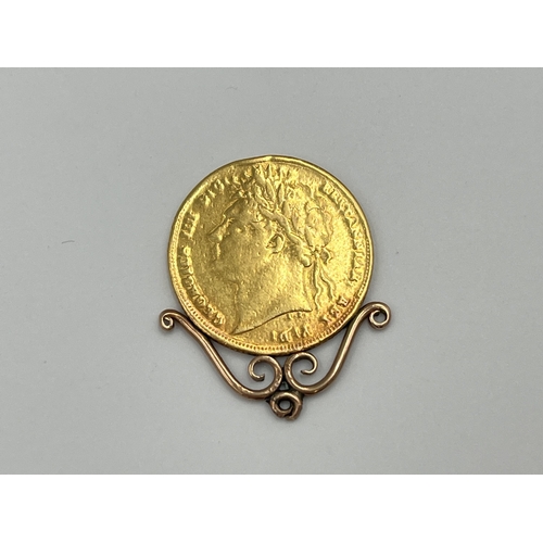 2310 - An 1821 George IV 22ct gold full sovereign with yellow metal mount - approx. gross weight 8.36g