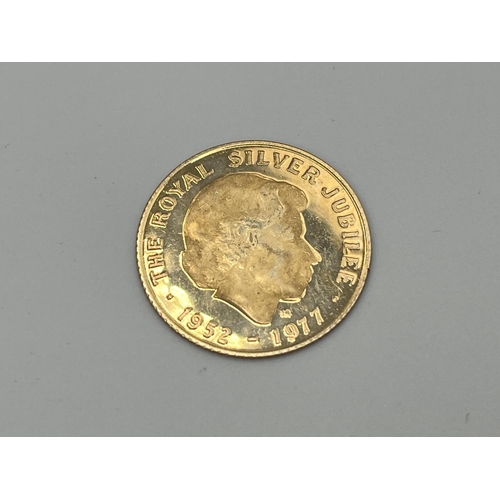 2315 - A 1952-1977 Queen Elizabeth II Silver Jubilee 9ct gold commemorative medal - approx. gross weight 2.... 