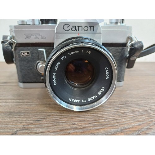 617 - A Canon FTb QL 35mm SLR camera fitted with 50mm 1:1.8 lens