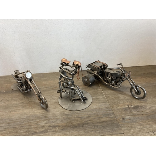 406 - A collection of handmade metal sculptures to include motorbikes, cars etc.