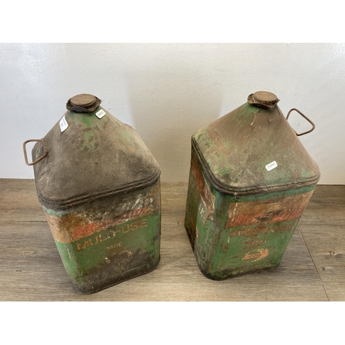 415 - Two mid 20th century Agricastrol Multi-Use oil cans - approx. 52cm high