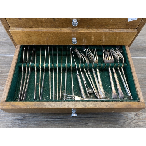 416 - A mid 20th century oak four drawer canteen of cutlery