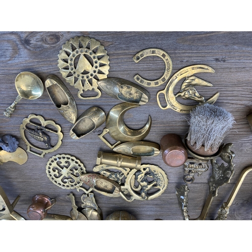 422 - A large collection of antique and later brassware to include 19th century companion set, pedestal bo... 