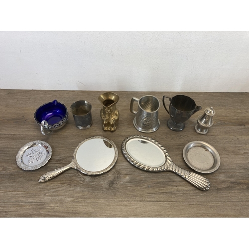 423 - A collection of metalware to include small brass pedestal bowl, cutlery, mid 20th century white enam... 