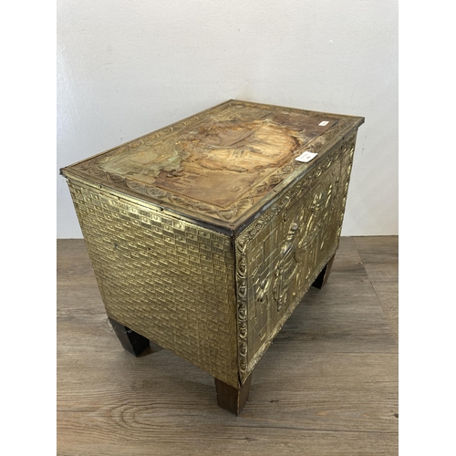 427 - A mid 20th century embossed brass coal store - approx. 41cm high x 46cm wide x 31cm deep