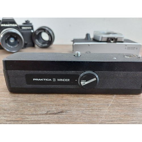 633 - Four Pentacon Praktica items, one BCA Electronic 35mm SLR camera fitted with Soligor f=35mm 1:3.5 wi... 