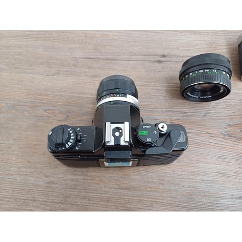 633 - Four Pentacon Praktica items, one BCA Electronic 35mm SLR camera fitted with Soligor f=35mm 1:3.5 wi... 