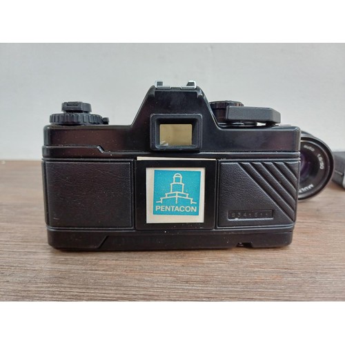 633 - Four Pentacon Praktica items, one BCA Electronic 35mm SLR camera fitted with Soligor f=35mm 1:3.5 wi... 