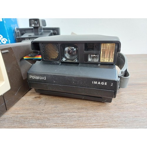 634 - Five Polaroid instant cameras to include boxed 636 Closeup, Image 2 etc. together with Polaroid Wink... 