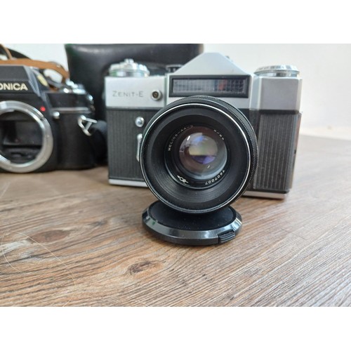 638 - Five 35mm SLR cameras, one boxed Fujica ST705w, one cased KMZ Zenit-E fitted with Helios-44-2 2/58 l... 