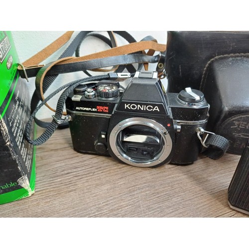 638 - Five 35mm SLR cameras, one boxed Fujica ST705w, one cased KMZ Zenit-E fitted with Helios-44-2 2/58 l... 