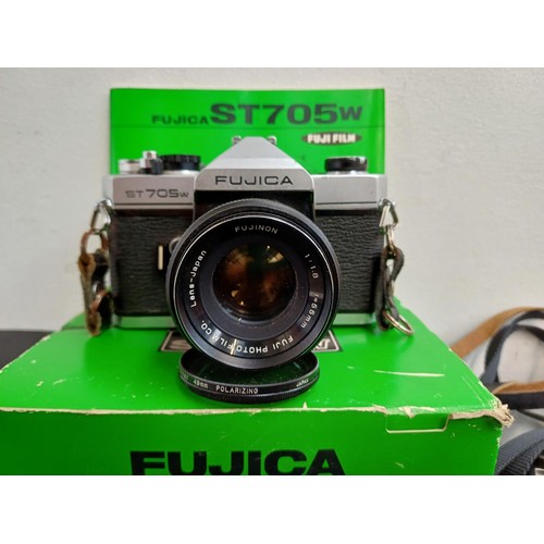 638 - Five 35mm SLR cameras, one boxed Fujica ST705w, one cased KMZ Zenit-E fitted with Helios-44-2 2/58 l... 