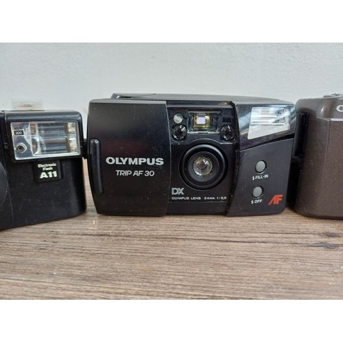 645 - Five Olympus compact 35mm cameras, XA2 fitted with A11 flash, Trip AF30, Superzoom 700BF, cased Trip... 