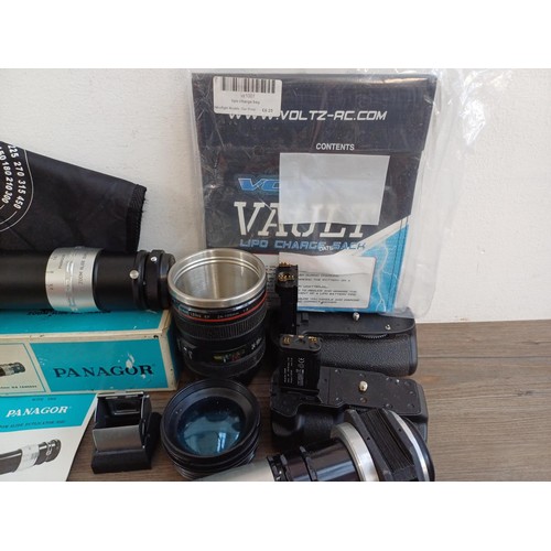 650 - A collection of photography accessories to include boxed Ricoh XR Winder-1, boxed Panagor zoom slide... 