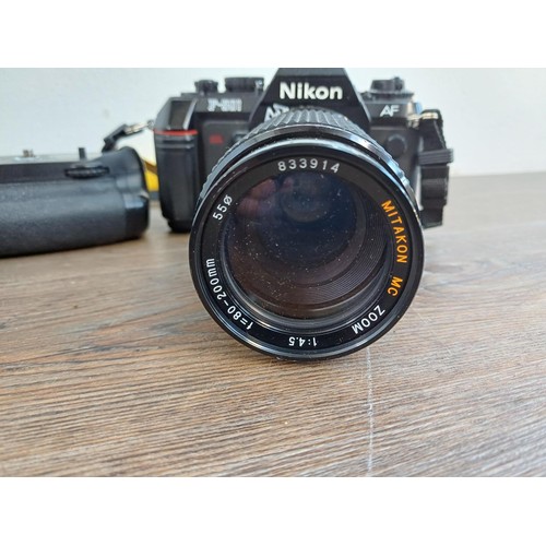 651 - Two Nikon 35mm autofocus SLR cameras, one F-501 fitted with Mitakon MC 80-200mm 1:4.5 zoom lens and ... 