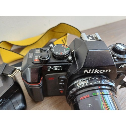 651 - Two Nikon 35mm autofocus SLR cameras, one F-501 fitted with Mitakon MC 80-200mm 1:4.5 zoom lens and ... 