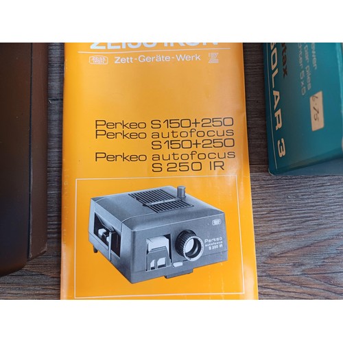 655 - A collection of items to include boxed Zeiss Ikon Perkeo S250 IR autofocus slide projector with inst... 