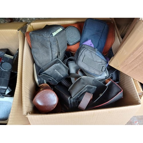 656 - Six boxes containing a large quantity of photography accessories to include flashes and flash bulbs,... 