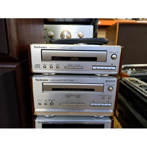 675 - A Technics hi-fi system comprising SL-HD51 CD player, RS-HD81 Dolby B cassette deck, ST-HD51 tuner, ... 