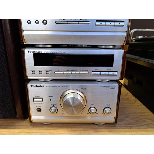 675 - A Technics hi-fi system comprising SL-HD51 CD player, RS-HD81 Dolby B cassette deck, ST-HD51 tuner, ... 