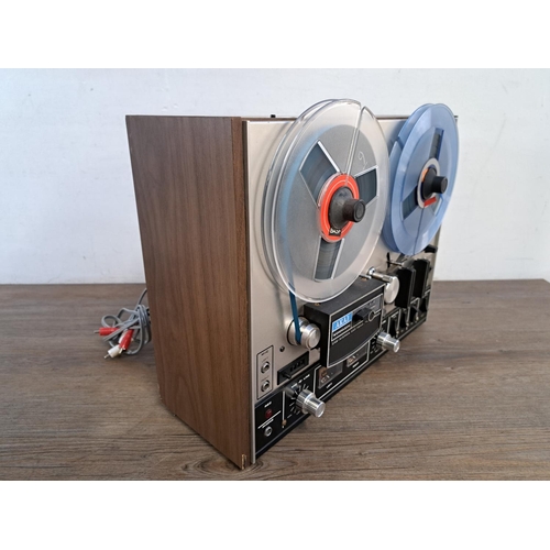 684 - A 1970s Akai 4000DS solid state reel-to-reel tape recorder with instruction manual