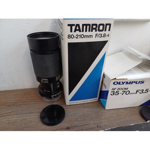 661 - A collection of boxed extension tubes, adaptors, tele-converters and lenses to include Tamron 80-210... 