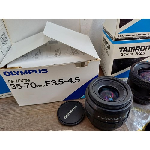 661 - A collection of boxed extension tubes, adaptors, tele-converters and lenses to include Tamron 80-210... 