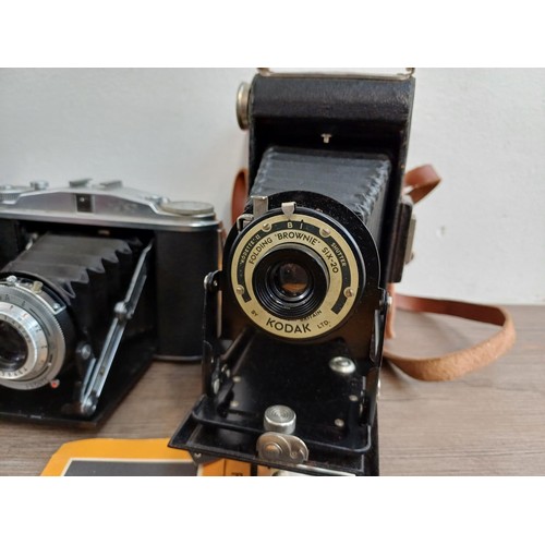 664 - Six folding cameras to include Agfa Isolette II, Coronet Rapide, Kodak Folding Brownie Six-20, bakel... 