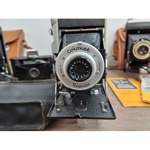 664 - Six folding cameras to include Agfa Isolette II, Coronet Rapide, Kodak Folding Brownie Six-20, bakel... 