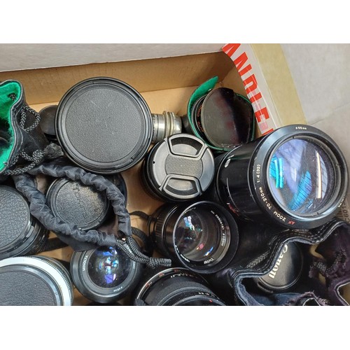 667 - A collection of lenses to include Minolta, Tamron, Sigma etc.