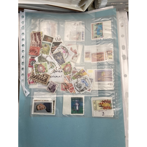 497 - Seven albums containing a large collection of worldwide stamps