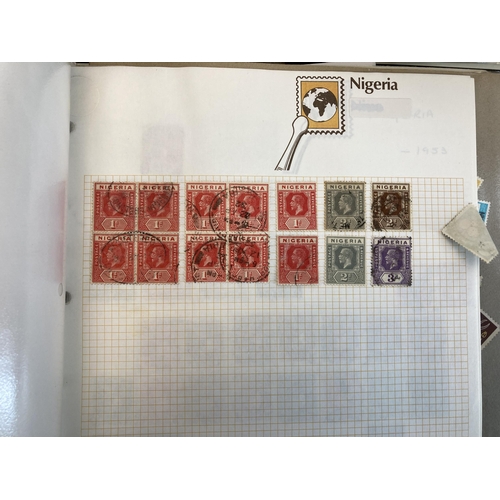 497 - Seven albums containing a large collection of worldwide stamps