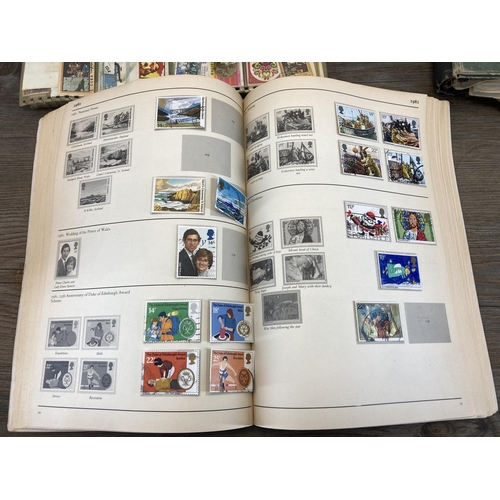 506 - Ten albums containing a collection of worldwide stamps