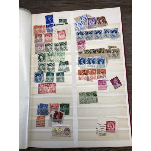 511 - Three albums containing a collection of British first day covers and stamps