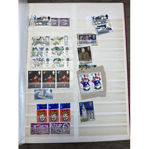 511 - Three albums containing a collection of British first day covers and stamps