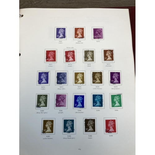 511 - Three albums containing a collection of British first day covers and stamps