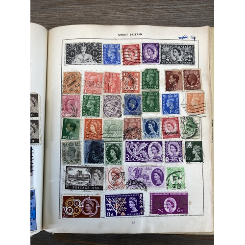 514 - An album containing a collection of worldwide stamps together with a collection of cigarette cards