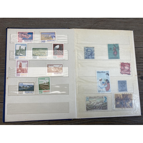 517 - Eight albums containing a collection of worldwide stamps