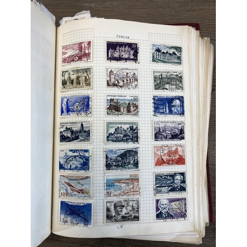 520 - Two albums containing a collection of worldwide stamps