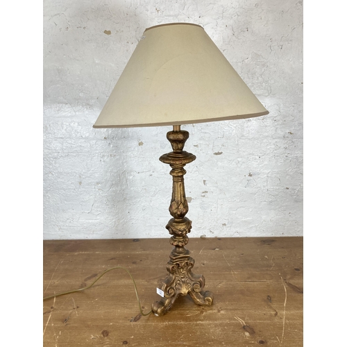 530 - A 19th century style gold painted ceramic table lamp with cream shade - approx. 80cm high