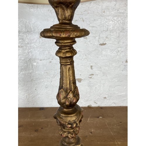 530 - A 19th century style gold painted ceramic table lamp with cream shade - approx. 80cm high