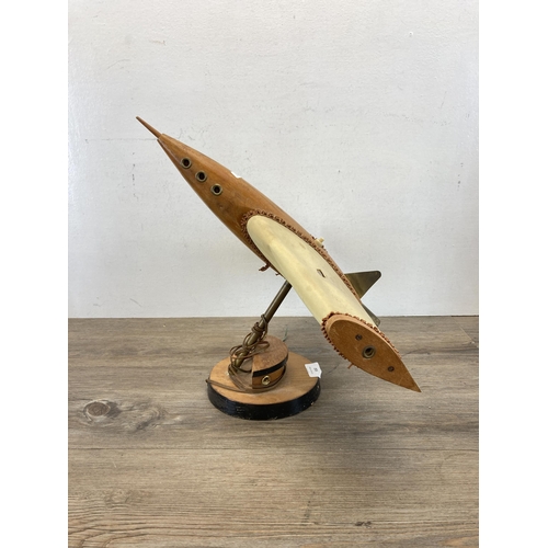 532 - A mid 20th century beech jet plane table lamp