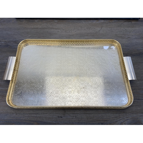 535 - Four vintage serving trays to include embroidered etc. - largest approx. 66cm long x 40.5cm wide