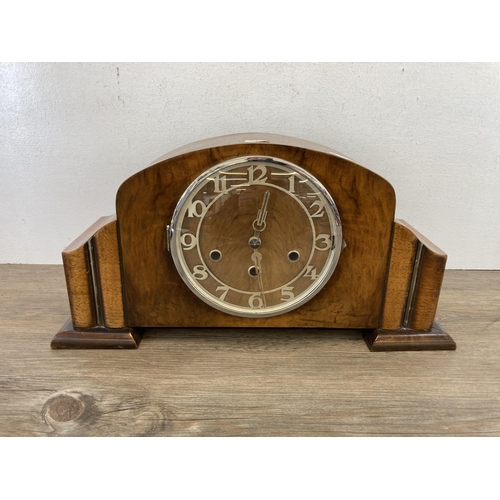 544 - An Art Deco walnut cased Westminster chiming mantel clock - approx. 23cm high x 44cm wide x 16cm dee... 