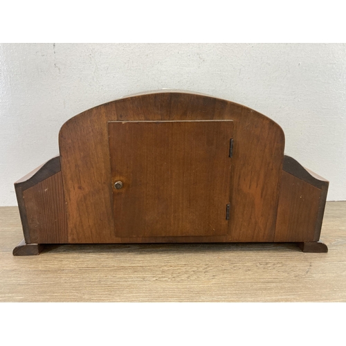 544 - An Art Deco walnut cased Westminster chiming mantel clock - approx. 23cm high x 44cm wide x 16cm dee... 