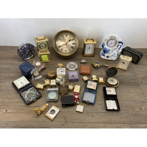 545 - A collection of clocks to include 1950s Westclox Big Ben Repeater mantel clock, Metamec brass cased ... 