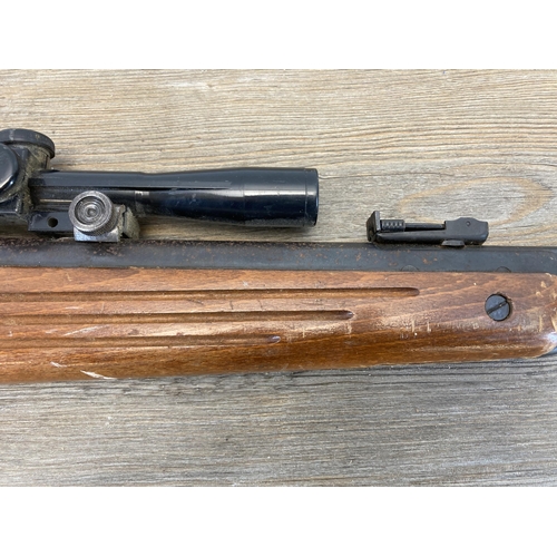 552 - A vintage B.S.A Guns Ltd 0.22Kal air rifle with matching scope